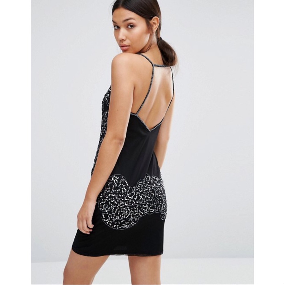 Black mini sequin dress.